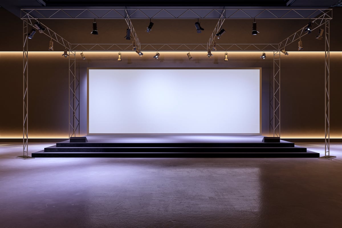 Modern stage setup with spotlights for corporate events