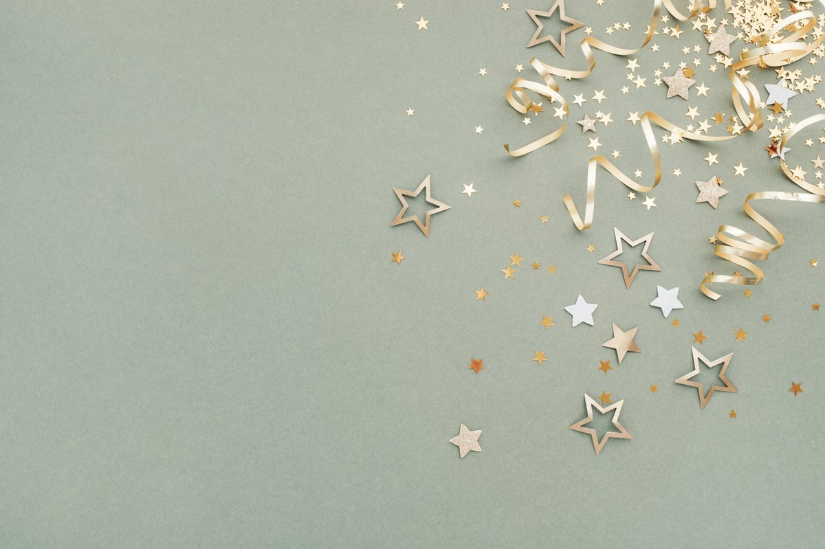 Festive celebration with golden confetti and party decorations